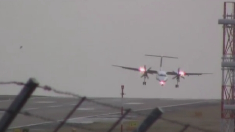 Incredible footage shows planes struggling to land in storms