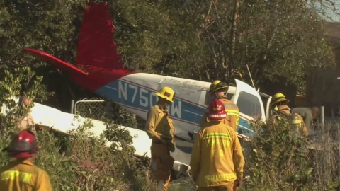 Plane crashes into Compton backyard
